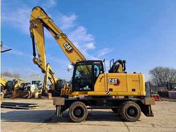 Колёсный экскаватор CATERPILLAR MH3024