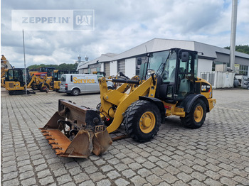 Колёсный погрузчик CATERPILLAR 906M