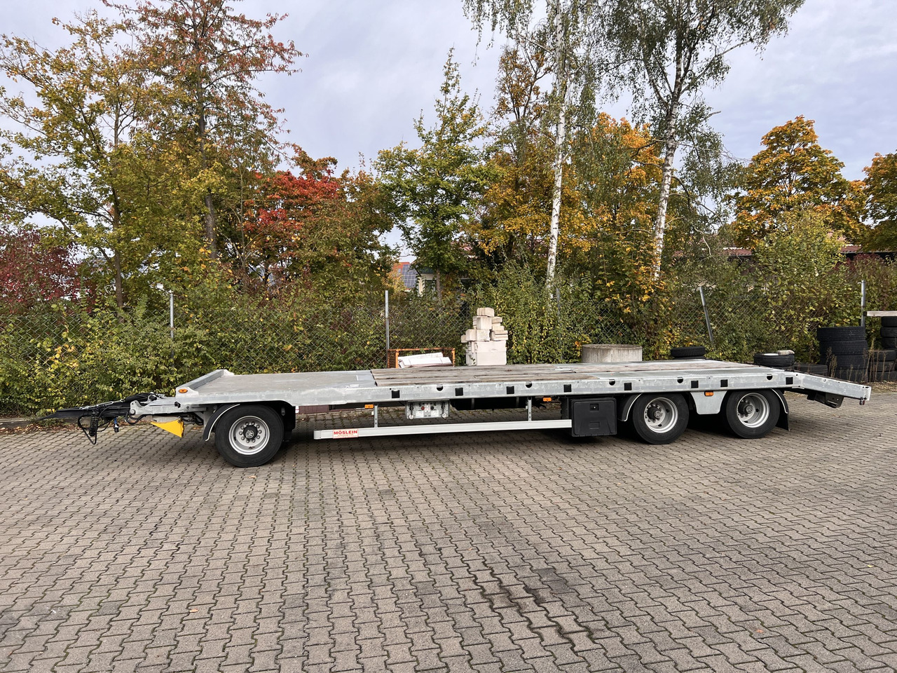 Möslein TO 3 F Schwebheim 3 Achs Tiefladeranhänger - Низкорамный прицеп: фото 1 Möslein TO 3 F Schwebheim 3 Achs Tiefladeranhänger - Низкорамный прицеп: фото 1