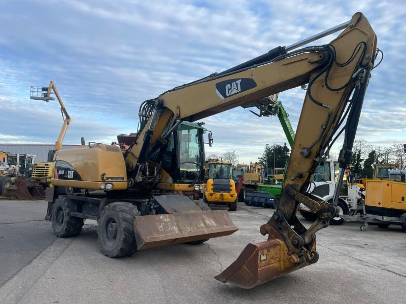 Caterpillar M316 - Колёсный экскаватор: фото 2 Caterpillar M316 - Колёсный экскаватор: фото 2