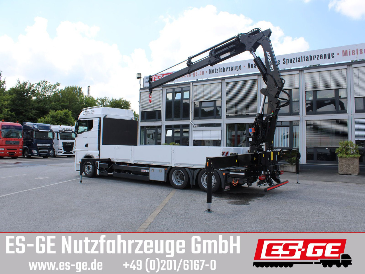 MAN TGX 26.480 6x2-4 LL CH mit MKG HLK531 a5 - Грузовик бортовой/ Платформа, Автоманипулятор: фото 2 MAN TGX 26.480 6x2-4 LL CH mit MKG HLK531 a5 - Грузовик бортовой/ Платформа, Автоманипулятор: фото 2