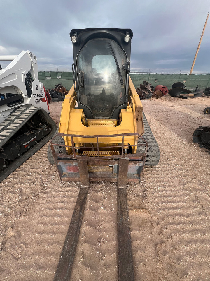 Caterpillar 279D - Мини-погрузчик с бортовым поворотом: фото 4 Caterpillar 279D - Мини-погрузчик с бортовым поворотом: фото 4