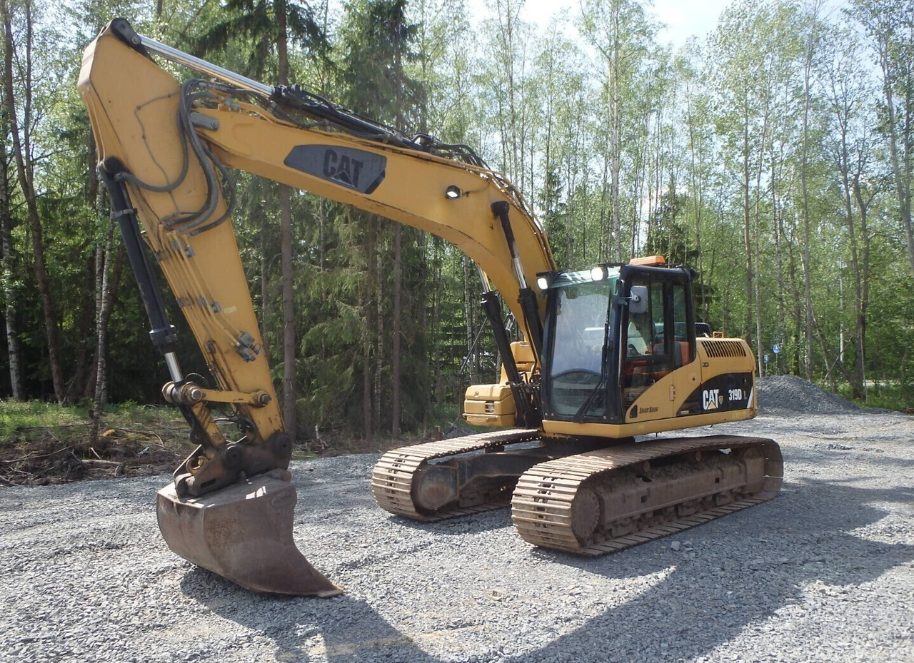 CATERPILLAR 319 DL - Гусеничный экскаватор: фото 3 CATERPILLAR 319 DL - Гусеничный экскаватор: фото 3