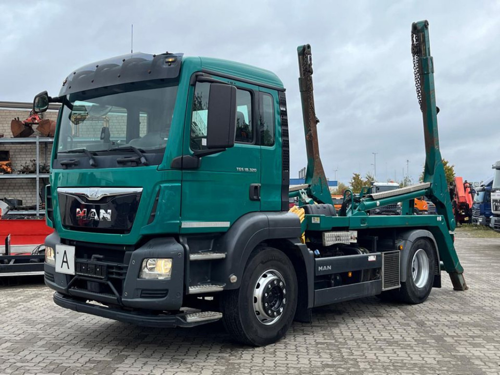 MAN TG-S 18.320 4x2 Absetzkipper VDL - Портальный бункеровоз: фото 1 MAN TG-S 18.320 4x2 Absetzkipper VDL - Портальный бункеровоз: фото 1
