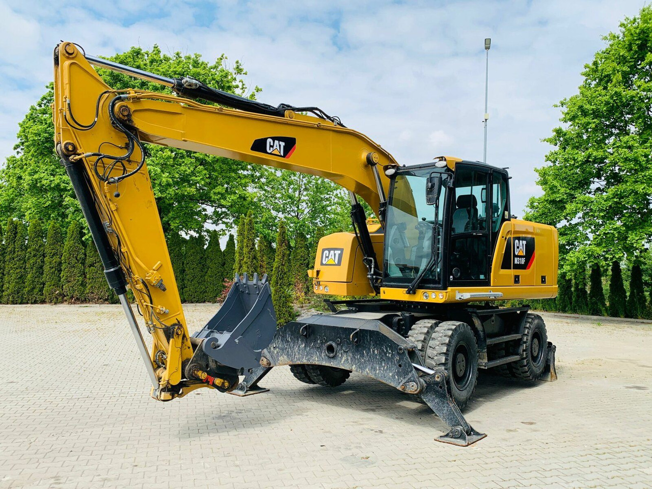 CAT M318F Mobilbagger *5.845 h *Schnellwechsel - Колёсный экскаватор: фото 1 CAT M318F Mobilbagger *5.845 h *Schnellwechsel - Колёсный экскаватор: фото 1