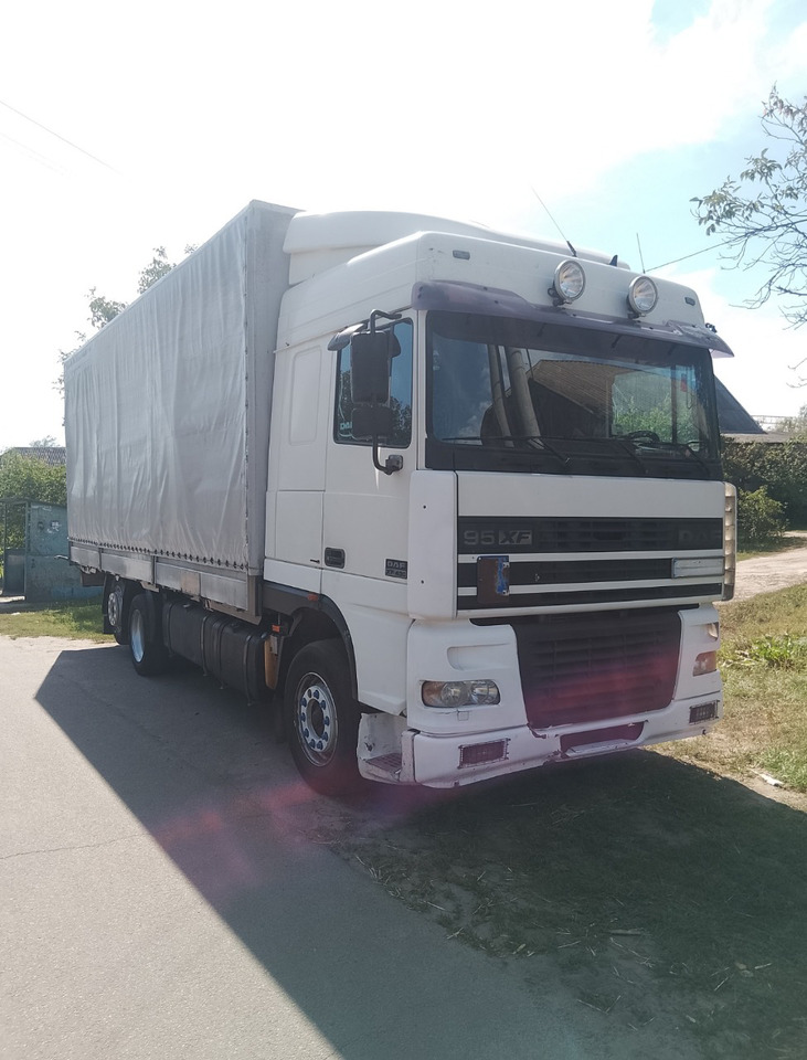DAF XF95.430 - Тентованный грузовик: фото 1 DAF XF95.430 - Тентованный грузовик: фото 1