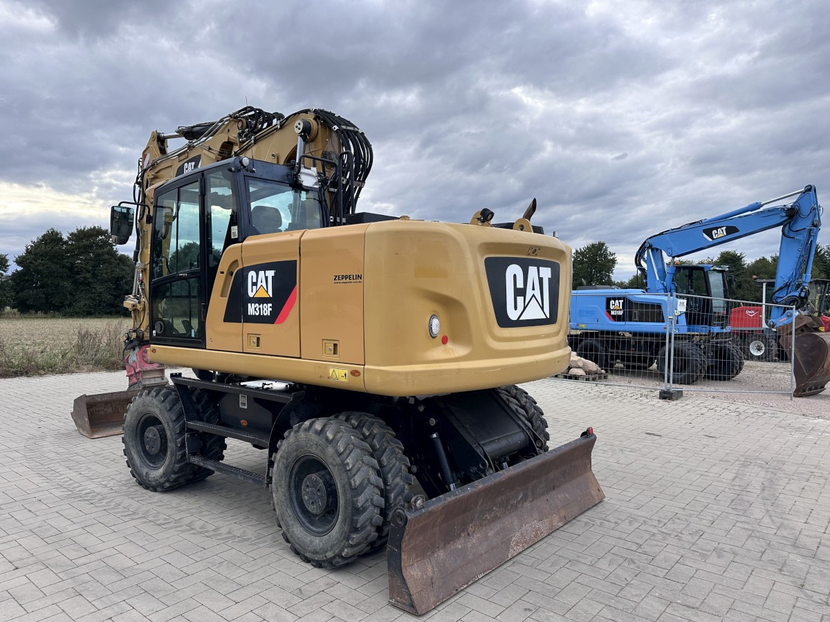 CATERPILLAR M 318 F Offset boom Deutsche Maschine Top ! - Колёсный экскаватор: фото 5 CATERPILLAR M 318 F Offset boom Deutsche Maschine Top ! - Колёсный экскаватор: фото 5