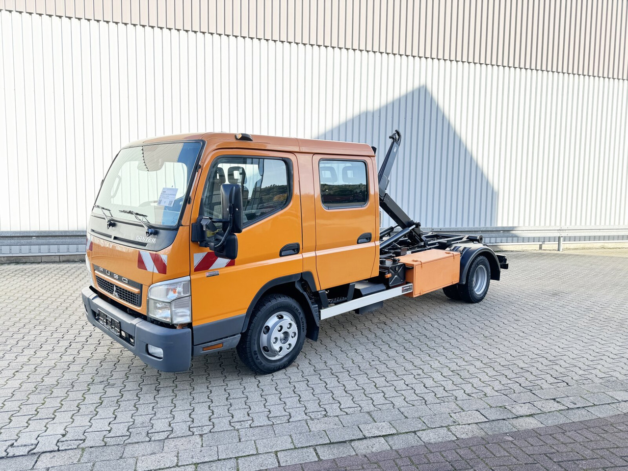 Mitsubishi Canter Fuso 6C15D 4x2 Doka Canter Fuso 6C15D 4x2 Doka, City-Abroller - Крюковой мультилифт: фото 1 Mitsubishi Canter Fuso 6C15D 4x2 Doka Canter Fuso 6C15D 4x2 Doka, City-Abroller - Крюковой мультилифт: фото 1