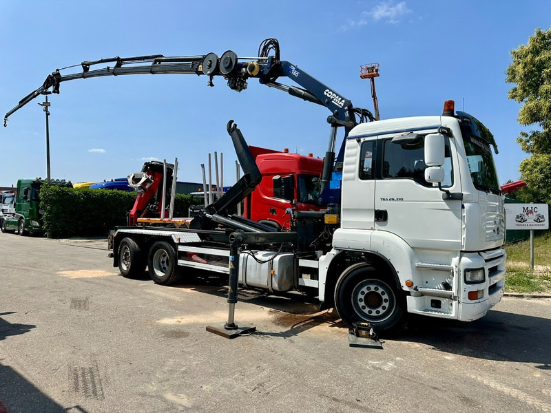 MAN TGA 26.310 6X2 HOOKLIFT + CRANE COPMA 160.4 + JIB J2 + WINCH - RADIO - LIFT + STEERING AXLE - EURO 3 - BE - Автоманипулятор: фото 1 MAN TGA 26.310 6X2 HOOKLIFT + CRANE COPMA 160.4 + JIB J2 + WINCH - RADIO - LIFT + STEERING AXLE - EURO 3 - BE - Автоманипулятор: фото 1