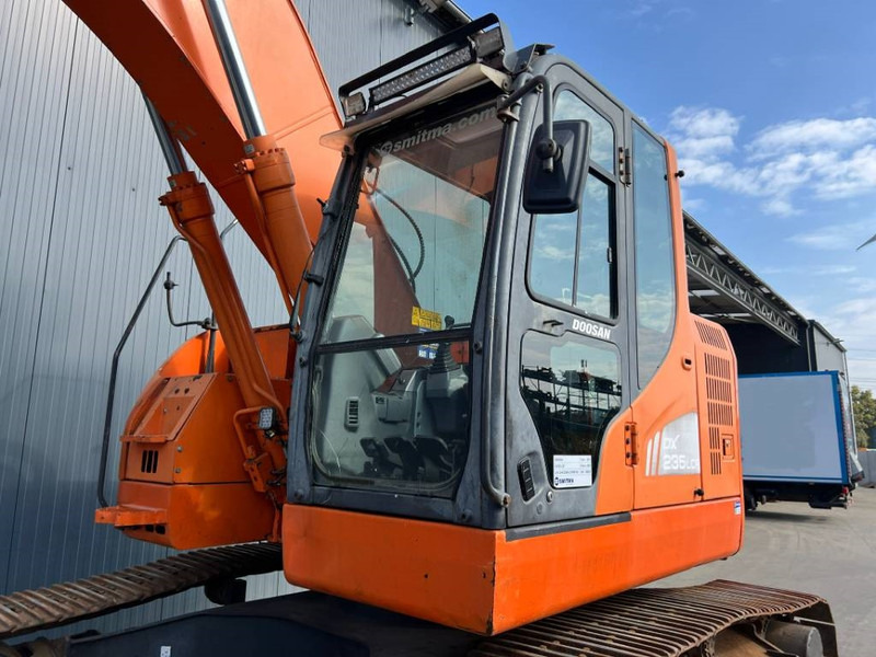 Doosan DX235LCR - Гусеничный экскаватор: фото 5 Doosan DX235LCR - Гусеничный экскаватор: фото 5