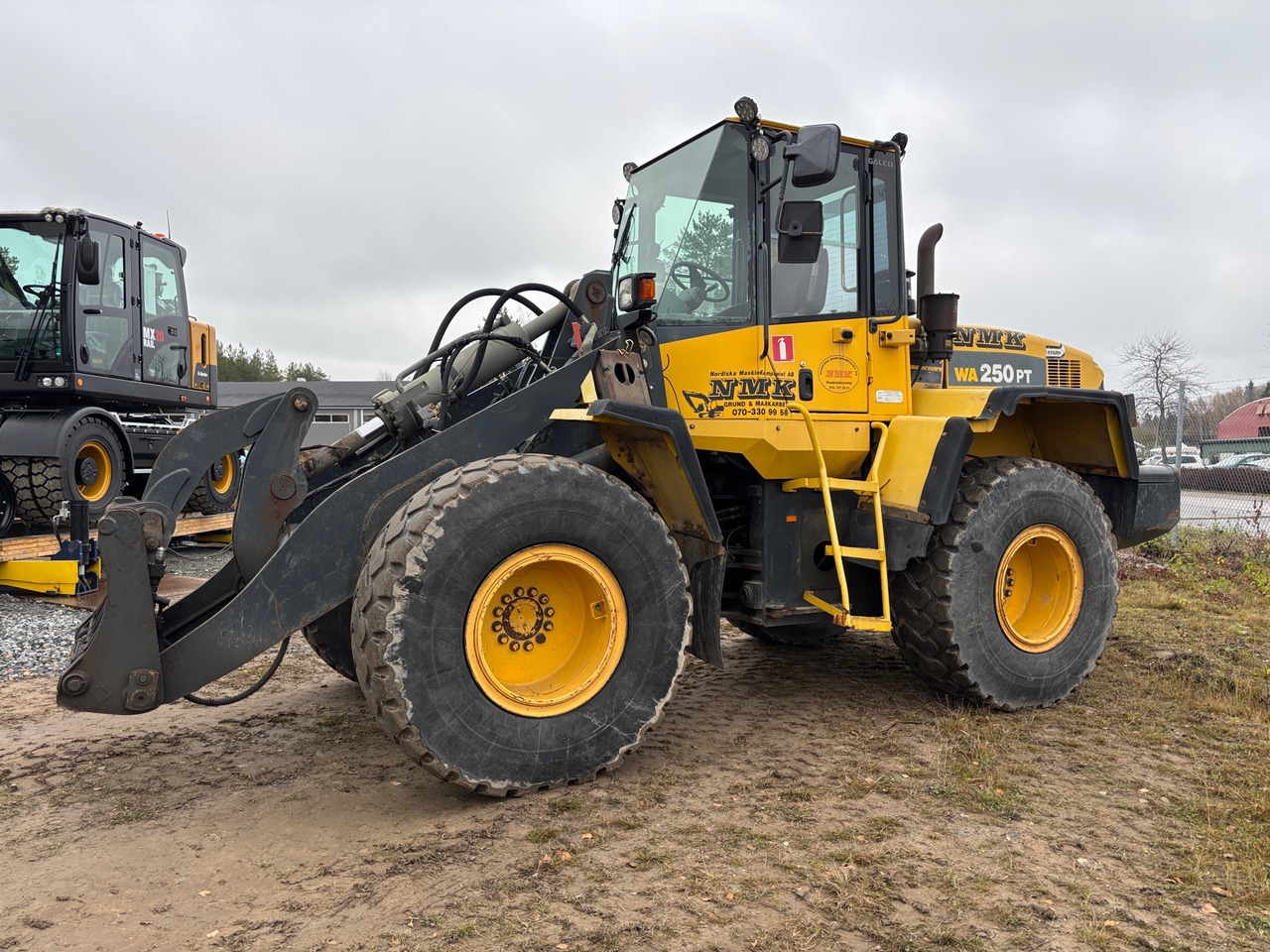 Komatsu WA250PT-5H - Колёсный погрузчик: фото 1 Komatsu WA250PT-5H - Колёсный погрузчик: фото 1