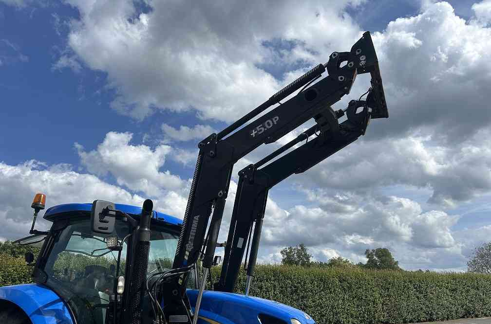 New Holland TSA 125, frontlader - Трактор: фото 5 New Holland TSA 125, frontlader - Трактор: фото 5
