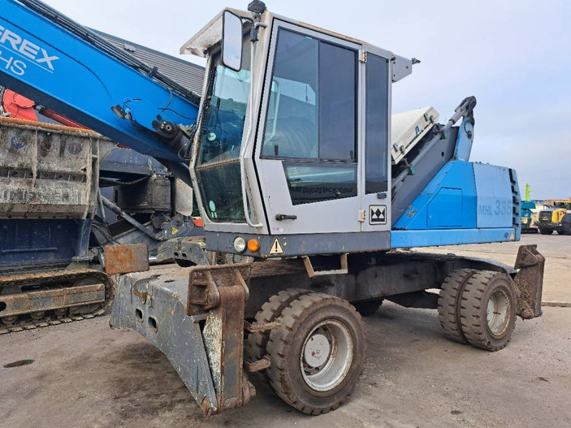 Fuchs MHL 335 - Перегружатель: фото 4 Fuchs MHL 335 - Перегружатель: фото 4