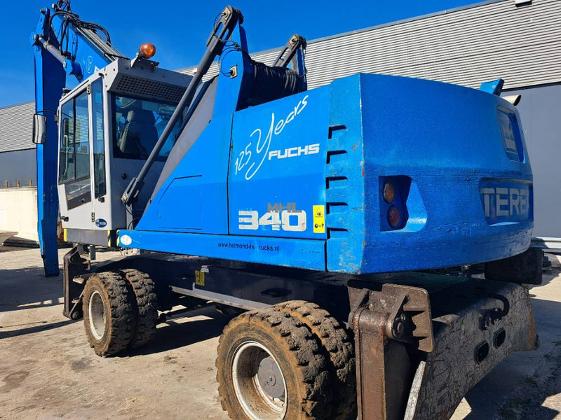 Fuchs MHL 340 D - Перегружатель: фото 1 Fuchs MHL 340 D - Перегружатель: фото 1