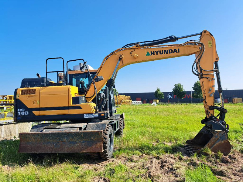 Hyundai HW140 - Колёсный экскаватор: фото 4 Hyundai HW140 - Колёсный экскаватор: фото 4