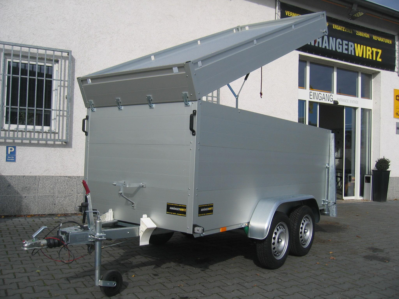 ALUBOXX Deckelanhänger GTT 1500 VT2 301x126x118cm Heckrampe (M) 1500kg order Aktion - Прицеп-фургон: фото 1 ALUBOXX Deckelanhänger GTT 1500 VT2 301x126x118cm Heckrampe (M) 1500kg order Aktion - Прицеп-фургон: фото 1
