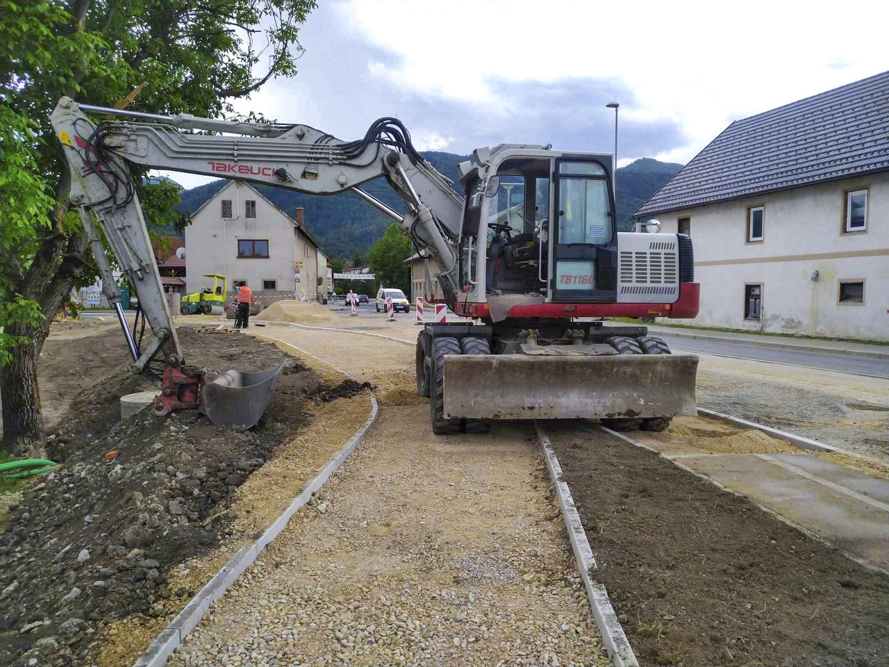 Takeuchi TB1160W - Колёсный экскаватор: фото 1 Takeuchi TB1160W - Колёсный экскаватор: фото 1