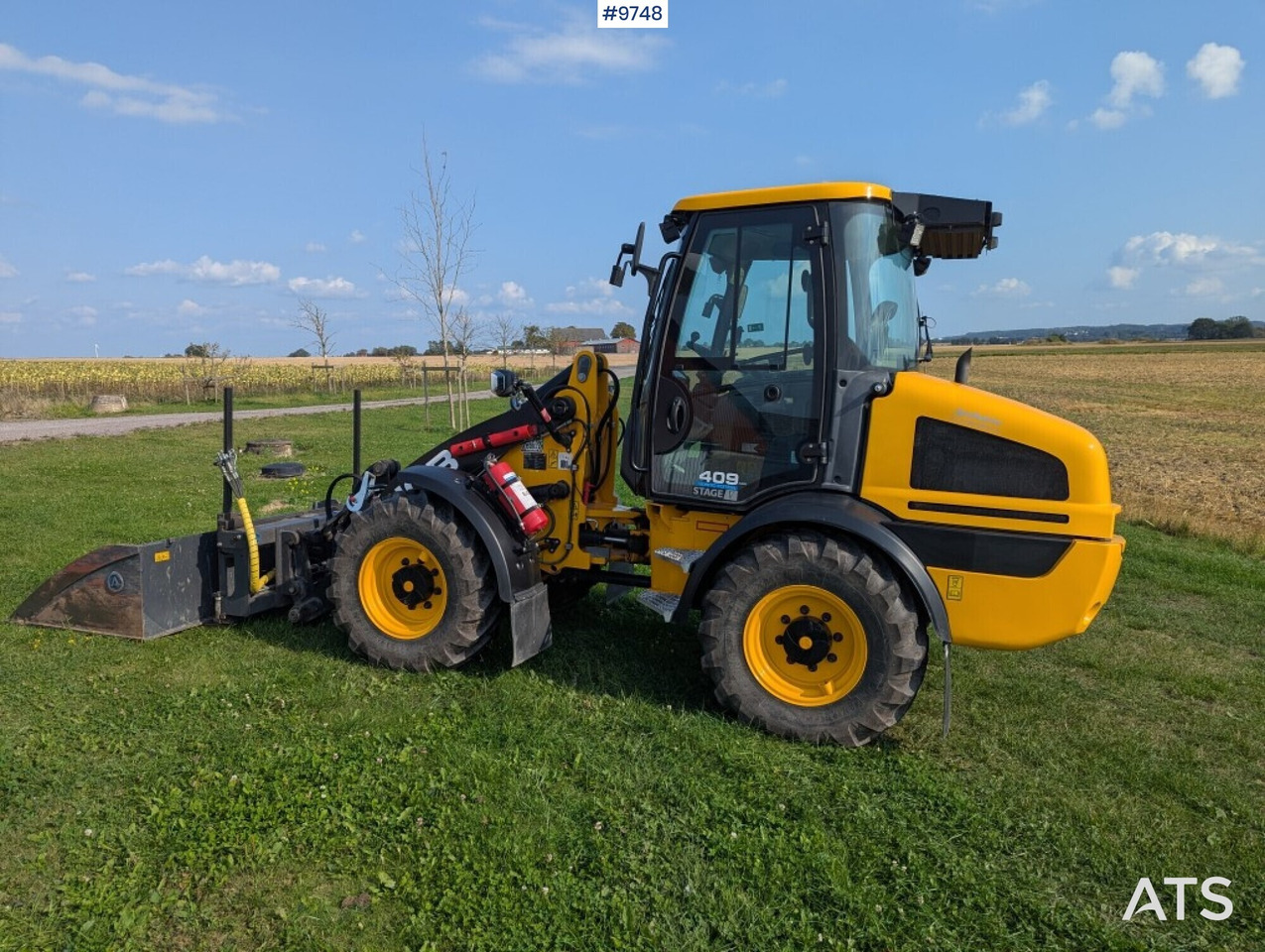 Wheel loader JCB 409 Stage V Nordic Edition 40km/h with attachments - Колёсный погрузчик: фото 4 Wheel loader JCB 409 Stage V Nordic Edition 40km/h with attachments - Колёсный погрузчик: фото 4