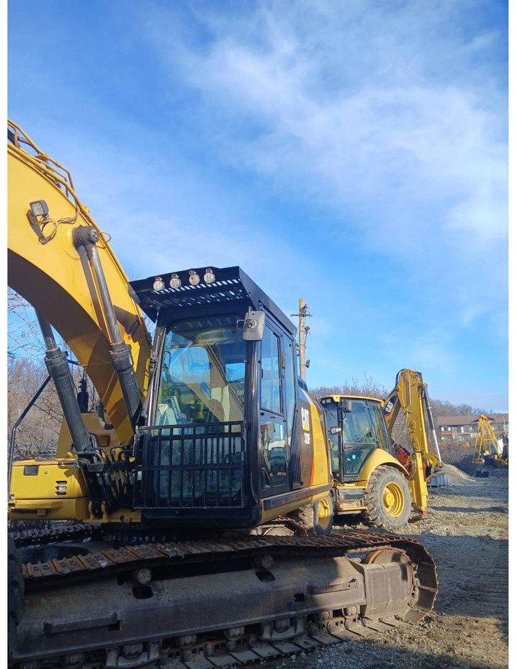 CAT 320FL - Гусеничный экскаватор: фото 1 CAT 320FL - Гусеничный экскаватор: фото 1
