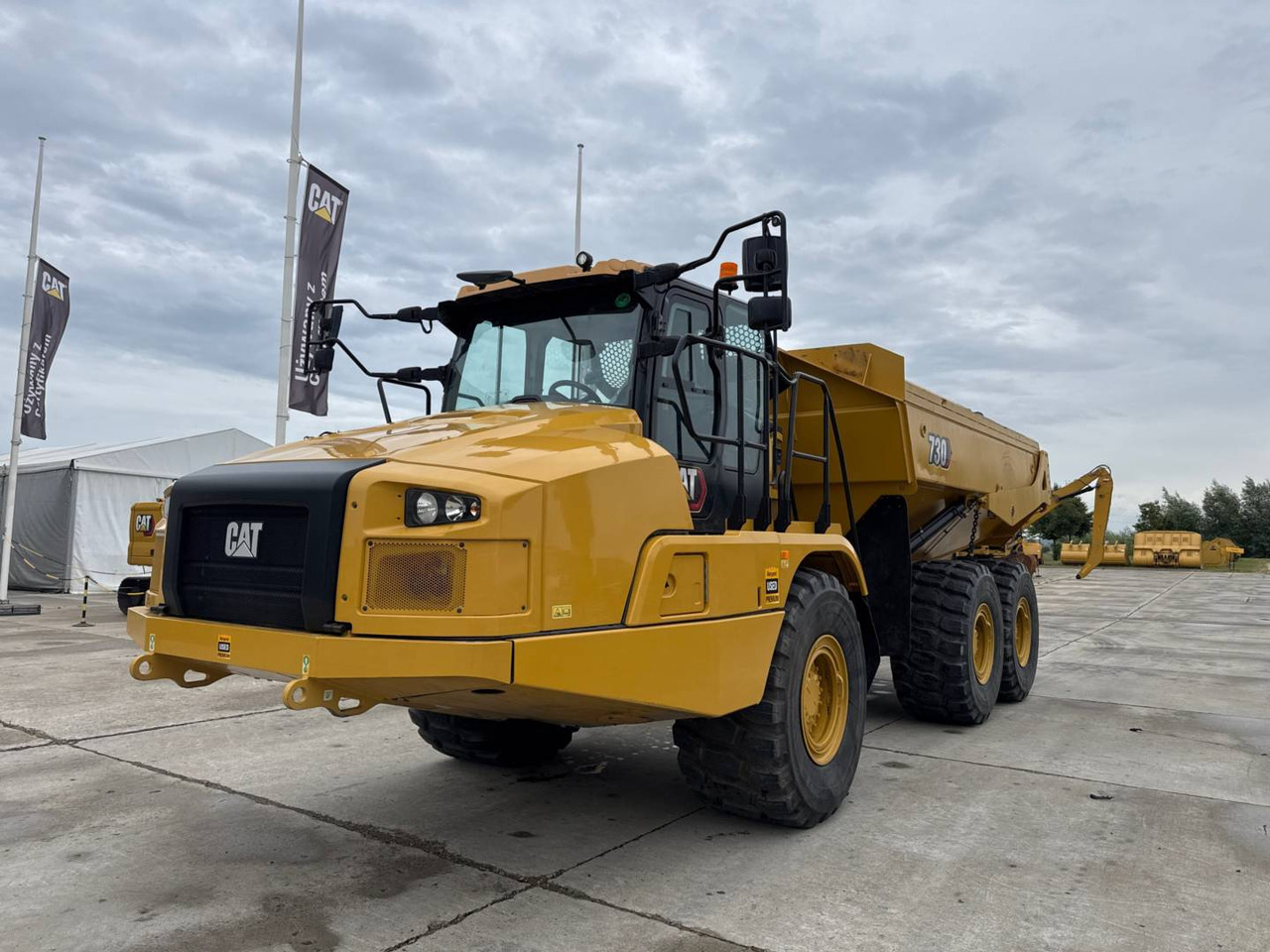 CAT 730 - Сочленённый самосвал: фото 1 CAT 730 - Сочленённый самосвал: фото 1