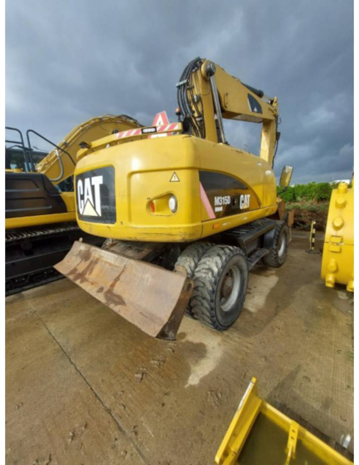 CAT M315D - Колёсный экскаватор: фото 3 CAT M315D - Колёсный экскаватор: фото 3