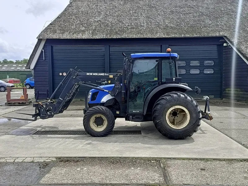 New Holland TN60DA TN60D met voorlader 520TL en vork - Трактор: фото 2 New Holland TN60DA TN60D met voorlader 520TL en vork - Трактор: фото 2
