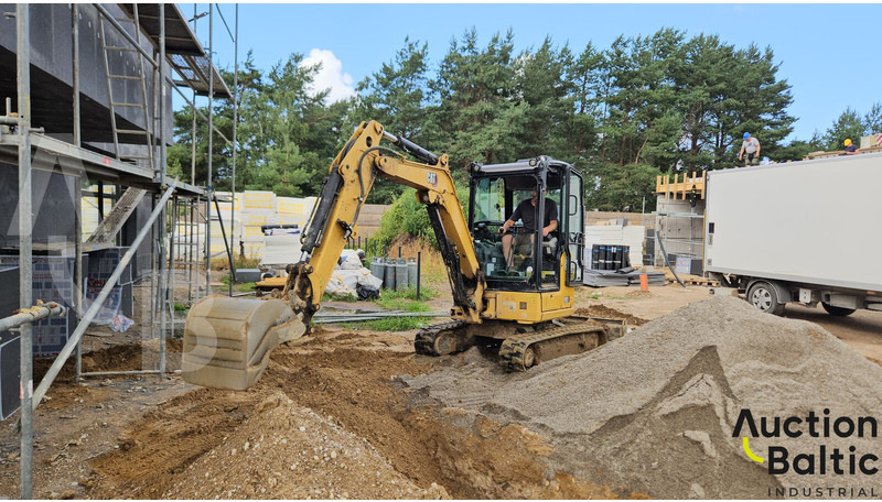 Caterpillar 303 CR - Мини-экскаватор: фото 1 Caterpillar 303 CR - Мини-экскаватор: фото 1