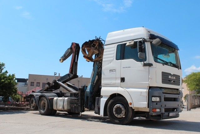 MAN TGA 26.360 FG 6x2 LL GERGEN Abroll + Penz Kran - Крюковой мультилифт, Автоманипулятор: фото 1 MAN TGA 26.360 FG 6x2 LL GERGEN Abroll + Penz Kran - Крюковой мультилифт, Автоманипулятор: фото 1