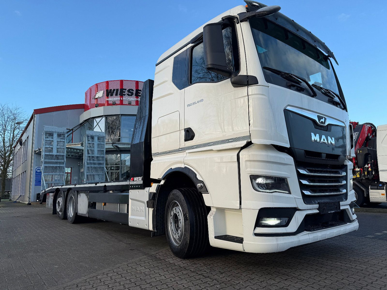 MAN Baumaschinen-  Arbeitsbühnentransporter Rampen - Грузовик бортовой/ Платформа: фото 2 MAN Baumaschinen-  Arbeitsbühnentransporter Rampen - Грузовик бортовой/ Платформа: фото 2