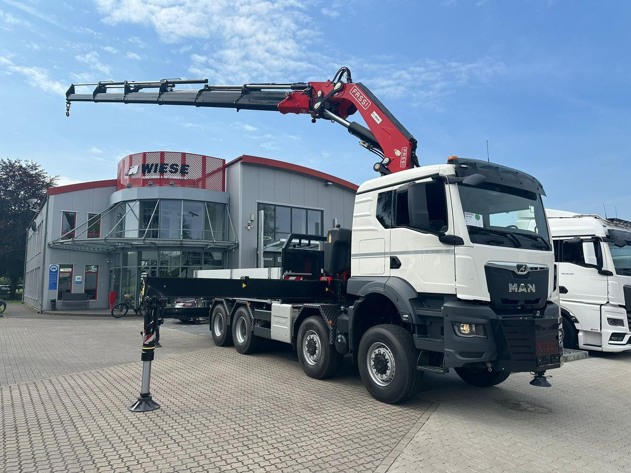 MAN TGS 41.520 8x8 mit Fassi Ladekran F710RA.2.26 - Автоманипулятор: фото 1 MAN TGS 41.520 8x8 mit Fassi Ladekran F710RA.2.26 - Автоманипулятор: фото 1
