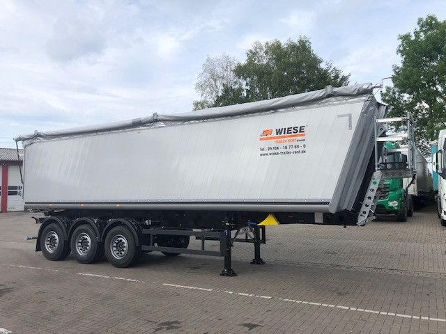 Schmitz Cargobull Kipper 52m³ mit gekröpftem Chassis - Самосвальный полуприцеп: фото 1 Schmitz Cargobull Kipper 52m³ mit gekröpftem Chassis - Самосвальный полуприцеп: фото 1