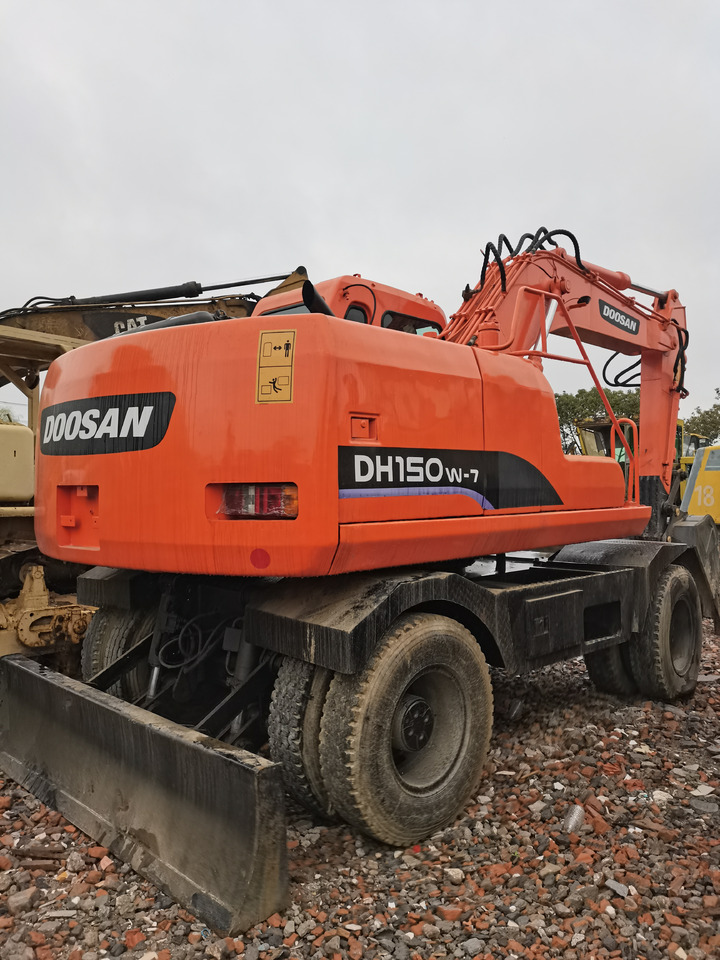 DOOSAN DH150W-7 - Колёсный экскаватор: фото 1 DOOSAN DH150W-7 - Колёсный экскаватор: фото 1