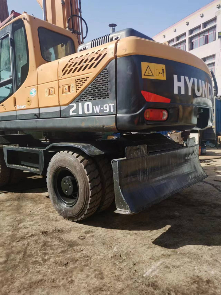 HYUNDAI 210W-9 - Колёсный экскаватор: фото 5 HYUNDAI 210W-9 - Колёсный экскаватор: фото 5