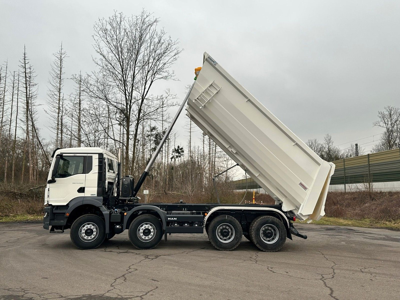 MAN TGS 41.400 8x4 / EUROMIX MTP 20m³/ EURO 5 - Портальный бункеровоз: фото 4 MAN TGS 41.400 8x4 / EUROMIX MTP 20m³/ EURO 5 - Портальный бункеровоз: фото 4