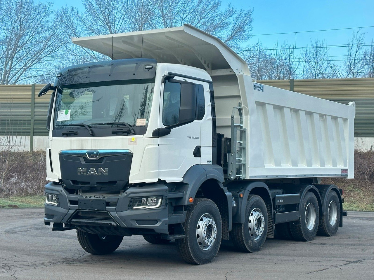 MAN TGS 41.400 8x4 / EUROMIX MTP 23m³/ Eckige Mulde - Самосвал: фото 1 MAN TGS 41.400 8x4 / EUROMIX MTP 23m³/ Eckige Mulde - Самосвал: фото 1