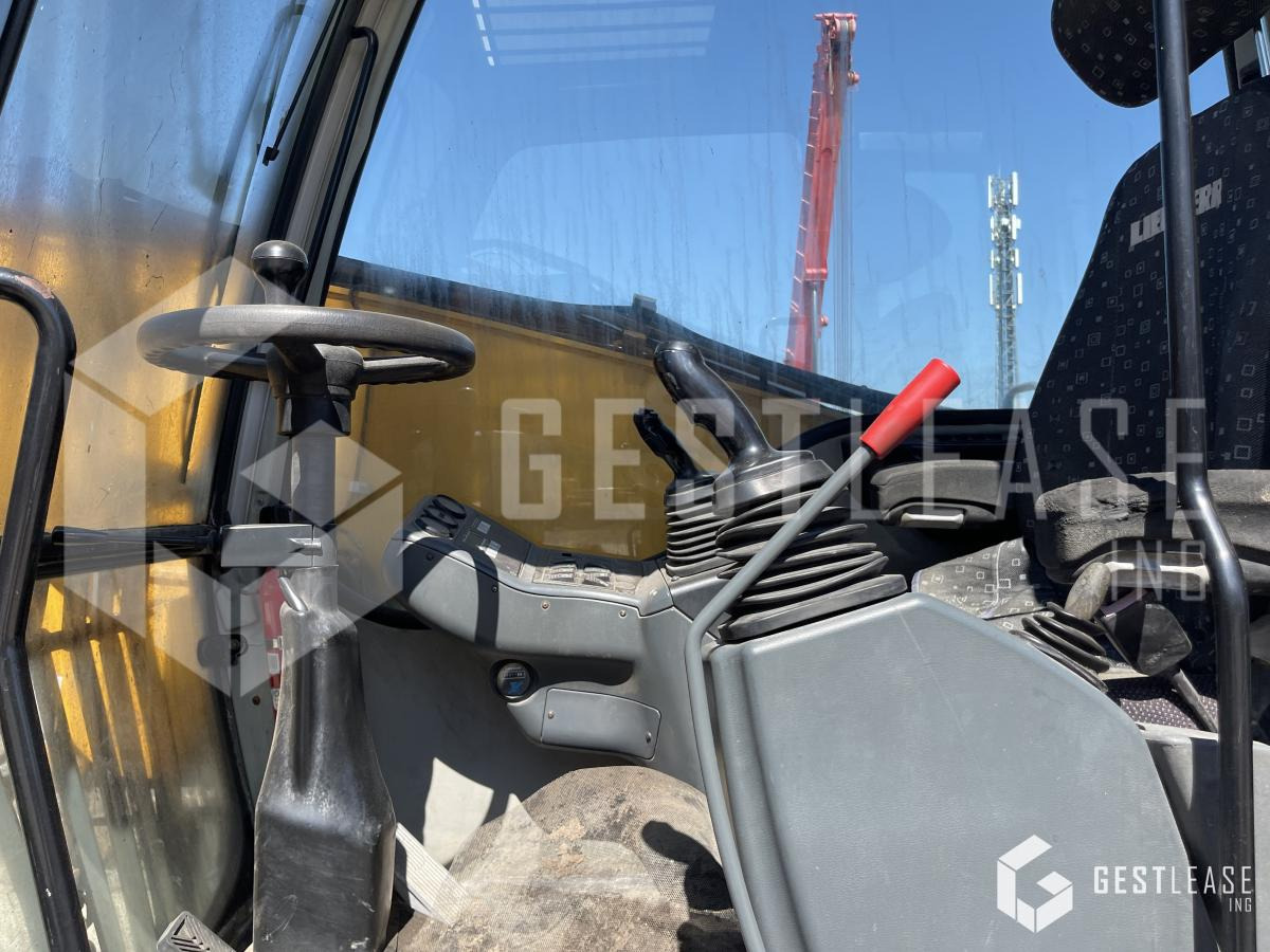 Колёсный экскаватор Liebherr A316: фото 7