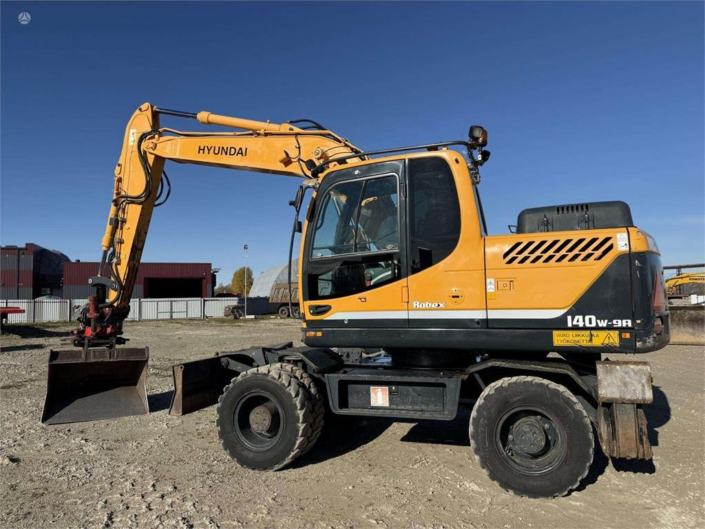 Hyundai Robex 140 W-9A Rototilt + grap - Колёсный экскаватор: фото 2 Hyundai Robex 140 W-9A Rototilt + grap - Колёсный экскаватор: фото 2