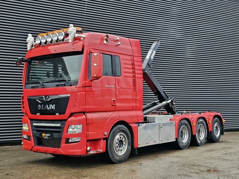 MAN TGX 35.500 / 8x4-4 / HOOKLIFT / ABROLL-KIPPER - Крюковой мультилифт: фото 1 MAN TGX 35.500 / 8x4-4 / HOOKLIFT / ABROLL-KIPPER - Крюковой мультилифт: фото 1