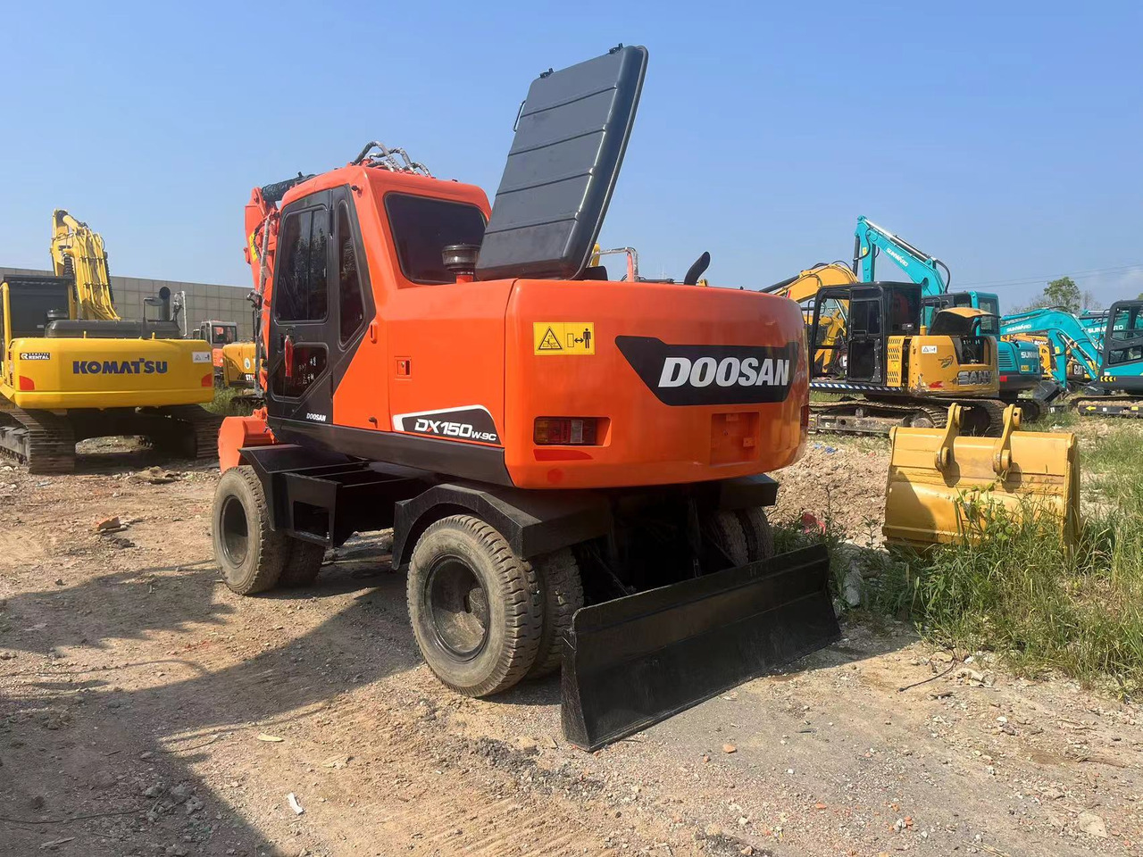 Doosan DX150W-9C - Колёсный экскаватор: фото 4 Doosan DX150W-9C - Колёсный экскаватор: фото 4