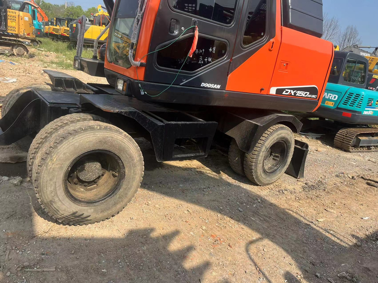 Doosan DX150W-9C - Колёсный экскаватор: фото 5 Doosan DX150W-9C - Колёсный экскаватор: фото 5