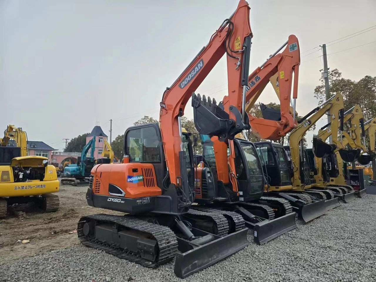 Doosan DX60-9 - Гусеничный экскаватор: фото 1 Doosan DX60-9 - Гусеничный экскаватор: фото 1