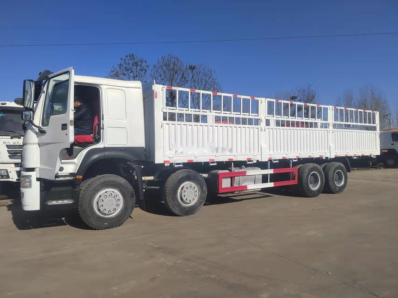 Sinotruk HOWO 8*4 Dump truck - Грузовик бортовой/ Платформа: фото 3 Sinotruk HOWO 8*4 Dump truck - Грузовик бортовой/ Платформа: фото 3