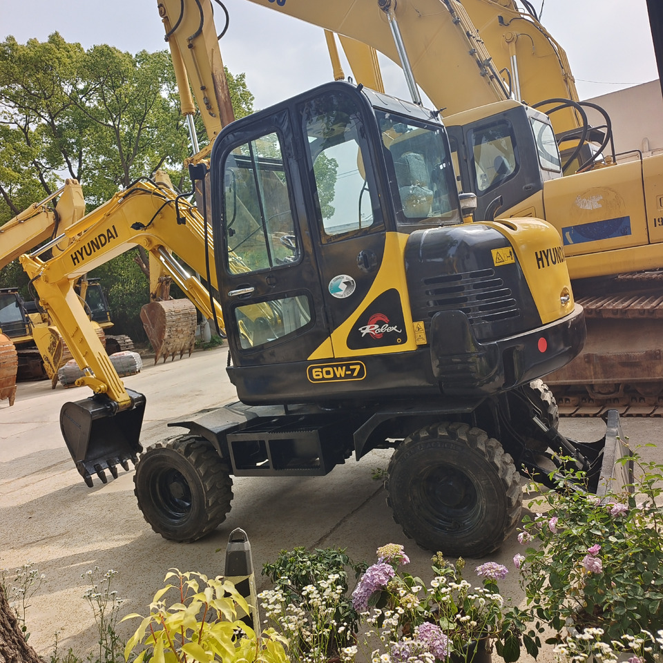 HYUNDAI R 60W - 7 R60W-7 - Колёсный экскаватор: фото 5 HYUNDAI R 60W - 7 R60W-7 - Колёсный экскаватор: фото 5
