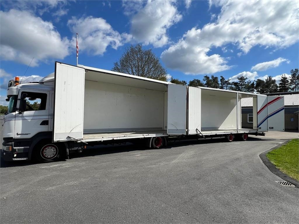 Scania R410 DB 4x2 MLB + tandem trailer 121m3 - Грузовик с закрытым кузовом: фото 1 Scania R410 DB 4x2 MLB + tandem trailer 121m3 - Грузовик с закрытым кузовом: фото 1