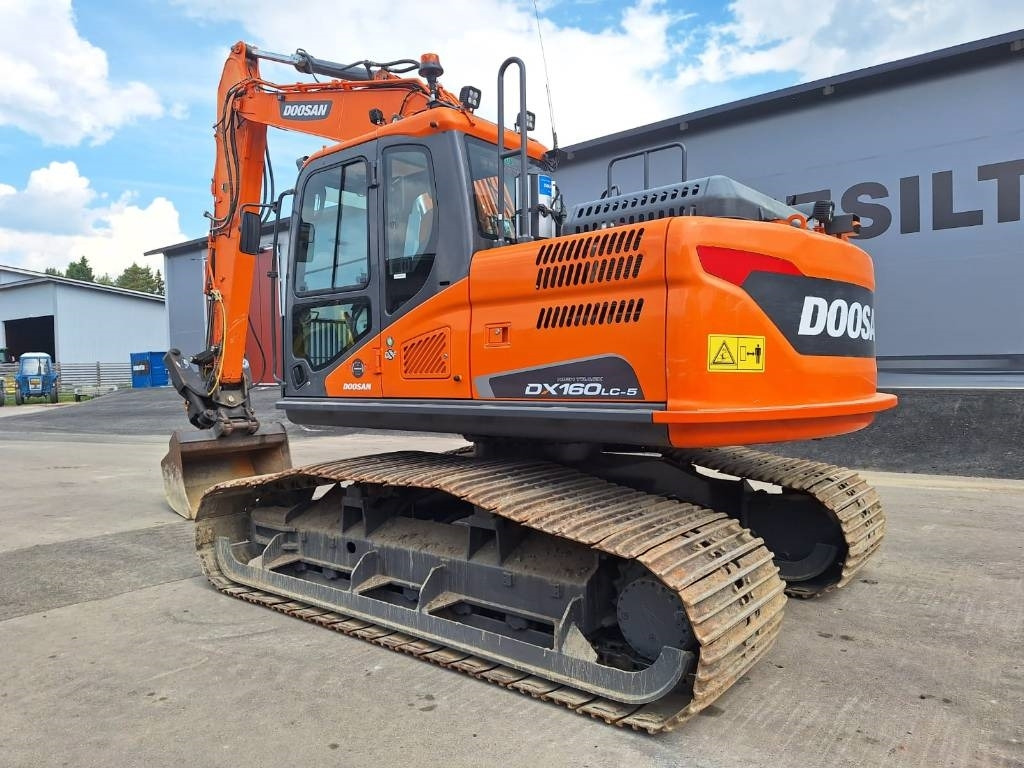 Doosan DX160LCH-5 METSÄMALLI KALLISTAJALLA - Гусеничный экскаватор: фото 2 Doosan DX160LCH-5 METSÄMALLI KALLISTAJALLA - Гусеничный экскаватор: фото 2