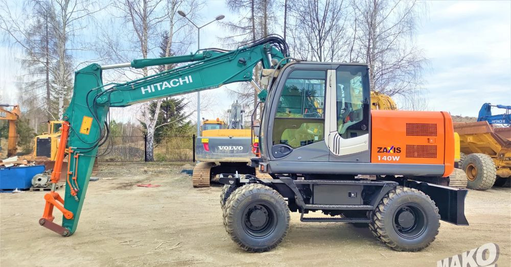 Hitachi ZX140W-3 - Колёсный экскаватор: фото 1 Hitachi ZX140W-3 - Колёсный экскаватор: фото 1