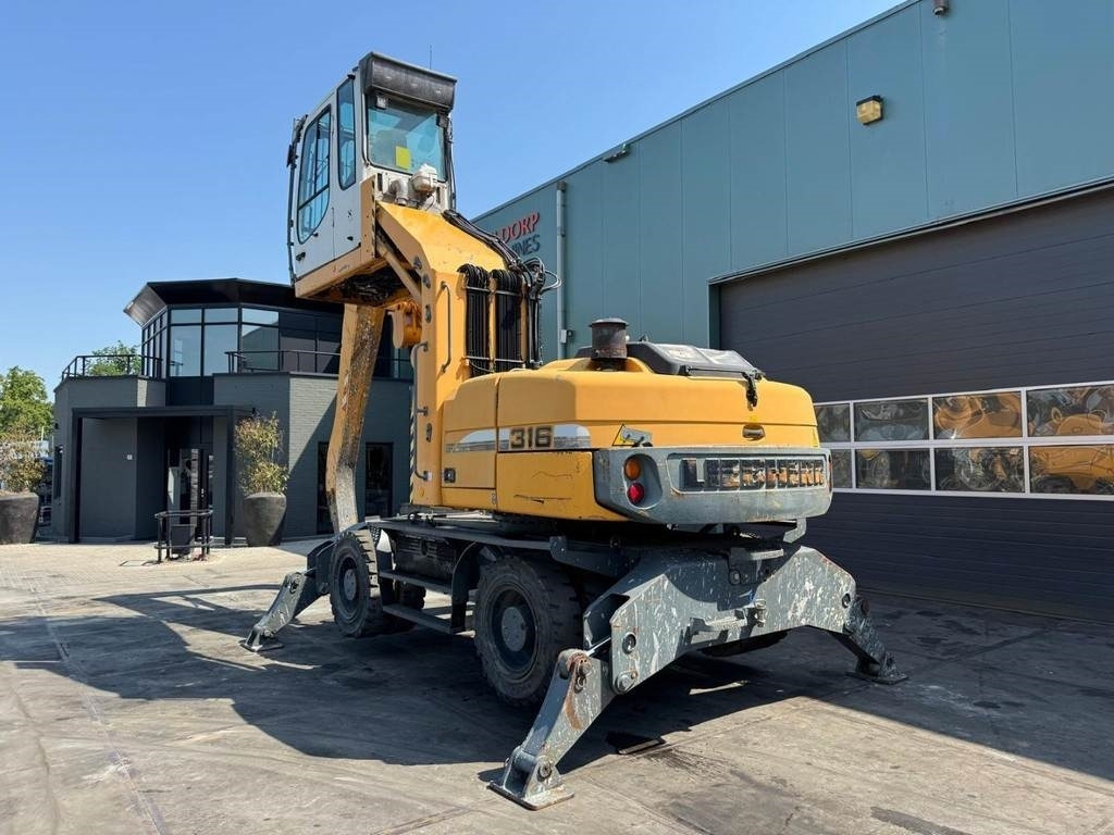 Liebherr A 316 - Перегружатель: фото 3 Liebherr A 316 - Перегружатель: фото 3