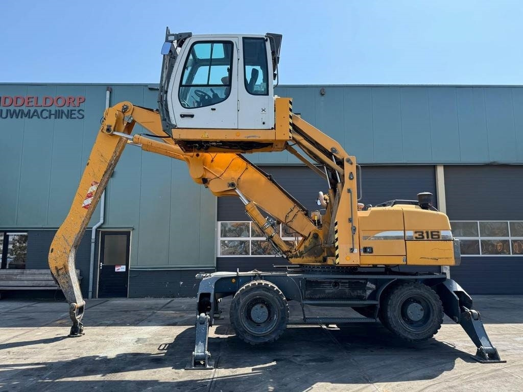 Liebherr A 316 - Перегружатель: фото 1 Liebherr A 316 - Перегружатель: фото 1