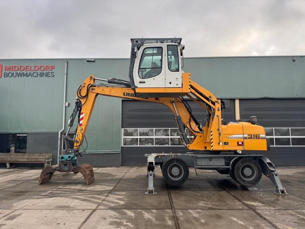 Liebherr A 316 - Перегружатель: фото 1 Liebherr A 316 - Перегружатель: фото 1