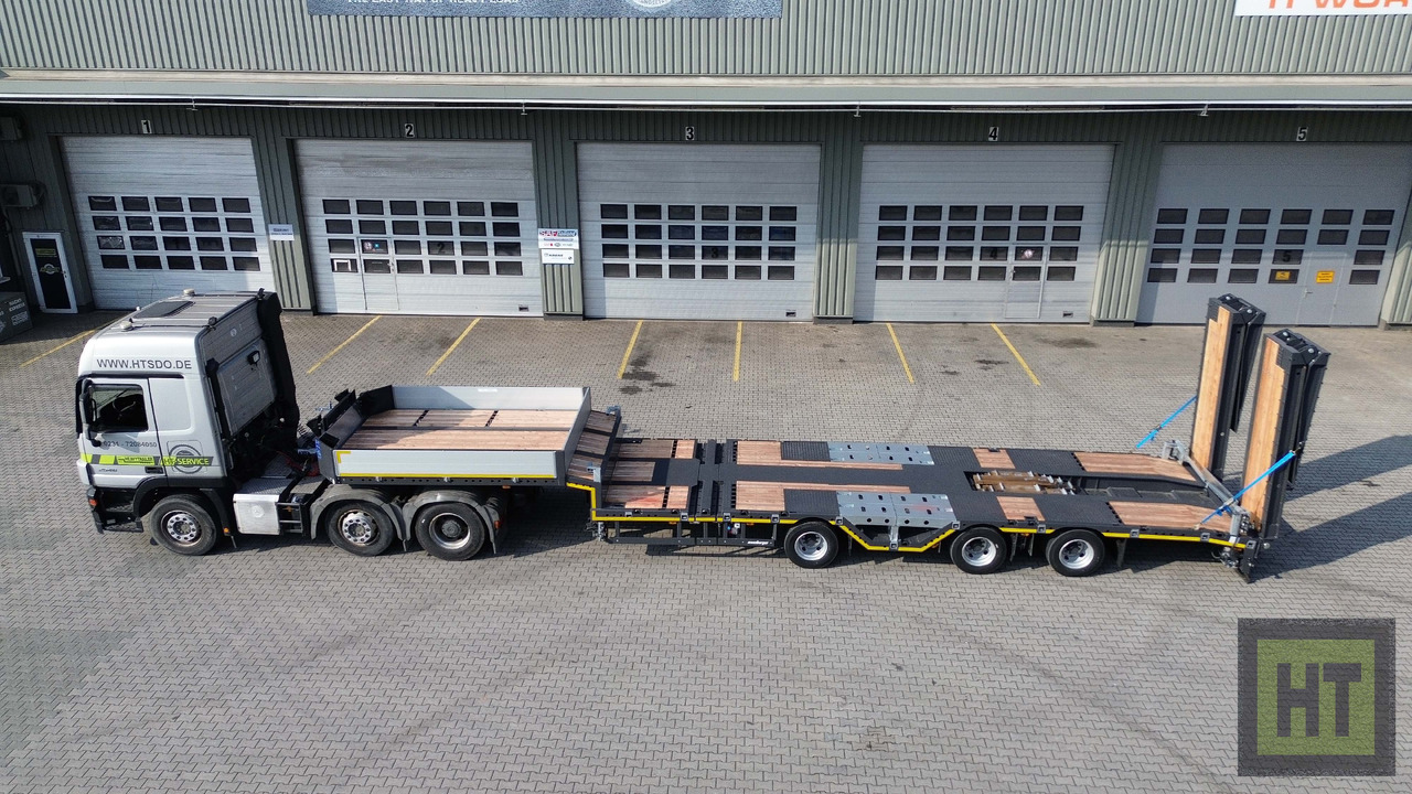 Meusburger 3-Achs-Tele-Semi mit 1 Paar Radmulden und hydr. Rampen - Низкорамный полуприцеп: фото 3 Meusburger 3-Achs-Tele-Semi mit 1 Paar Radmulden und hydr. Rampen - Низкорамный полуприцеп: фото 3